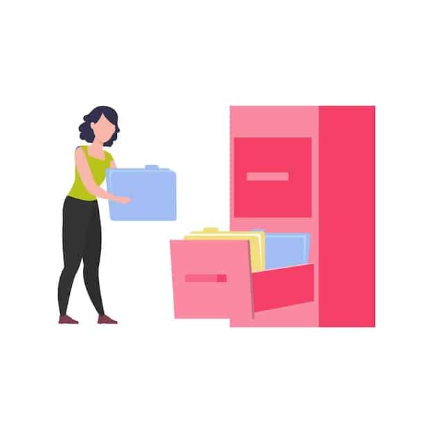 A person organizing documents into a folder labeled 