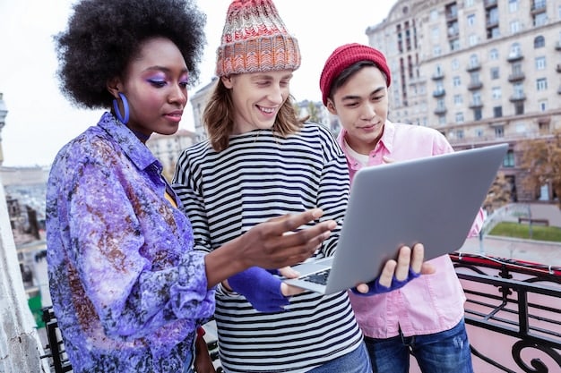 A diverse group of students collaborating on a project using laptops and tablets, showcasing the accessibility and inclusivity of online education.