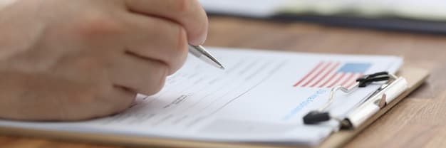 A close-up of a FAFSA application form with a pen highlighting specific sections, emphasizing the need for accuracy and attention to detail.