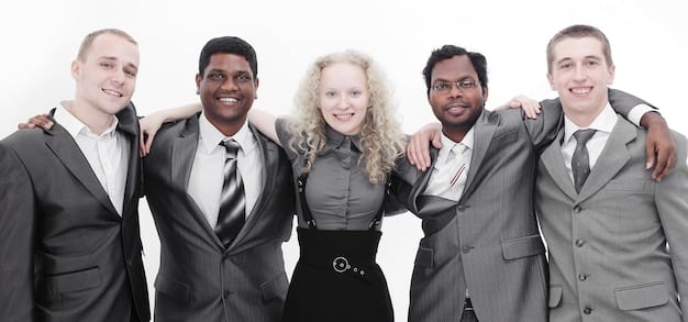 A diverse group of people, dressed in professional attire, standing together and smiling. They are in front of a building that could represent a public service organization or a non-profit. The image conveys a sense of community and the rewarding aspects of public service.