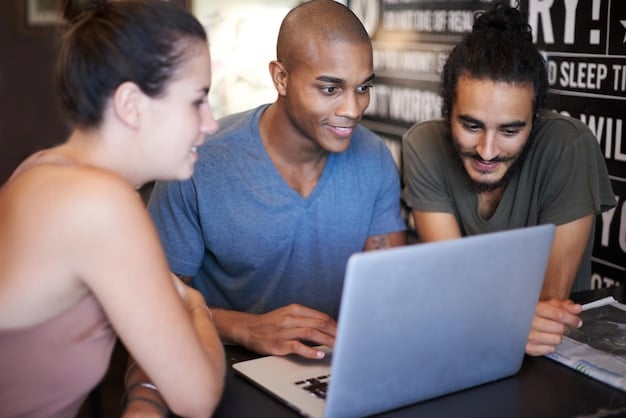 A diverse group of professionals participating in a micro-credential course online, visible on their laptops. The scene is brightly lit, depicting a modern learning environment focused on specific skill acquisition.