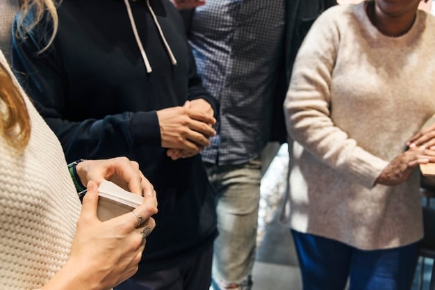 A group of people networking at an industry event, exchanging business cards and engaging in conversation. The scene is lively with a focus on collaboration and connection.