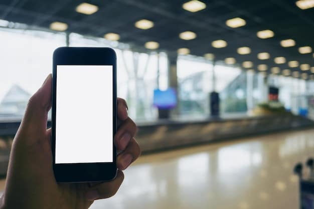 A close-up of a mobile phone displaying the TSA PreCheck digital pass, with a blurred background showing the airport boarding gate area.