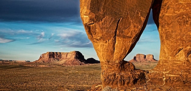 A stunning photograph of a Natural National Monument, showcasing its unique geological features such as volcanic rock formations, towering cliffs, or expansive desert landscapes.
