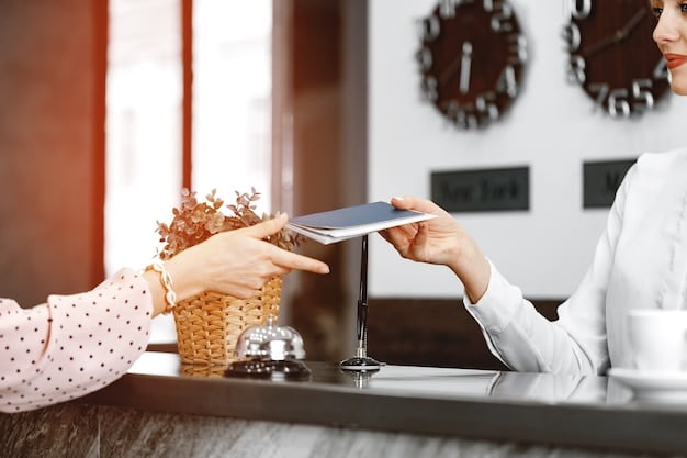 A person using a credit card to pay for a hotel bill at the front desk. The scene is well-lit and portrays a seamless transaction, highlighting the convenience of using credit cards for travel expenses.