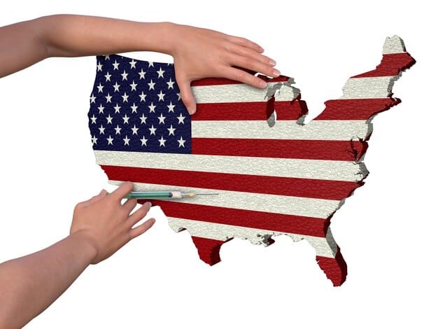 A map of the United States with pins marking various tourist destinations, and a hand hovering over it with a credit card.
