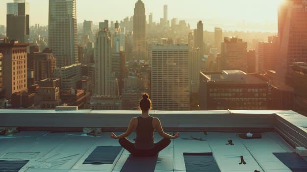 A digital nomad doing yoga on a rooftop with a cityscape in the background. The person is stretching and appears focused and at peace.