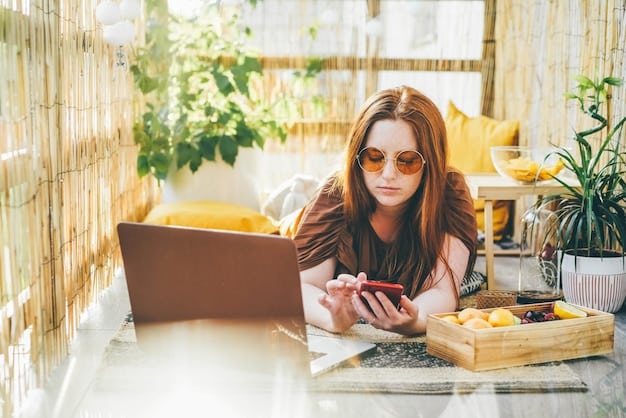 A digital nomad sitting at a cafe table, using a laptop with a budgeting app open, with a credit card and a cup of coffee nearby. The cafe has a relaxed, vibrant atmosphere.
