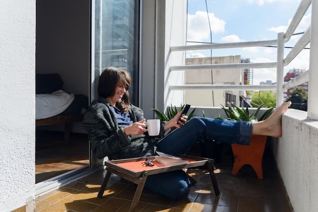 A digital nomad sipping coffee on the balcony of a stylishly furnished monthly rental apartment, overlooking a vibrant neighborhood in a US city.