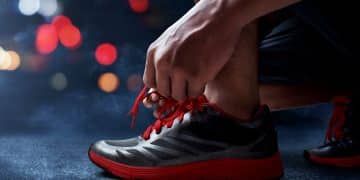 Man tying running shoes